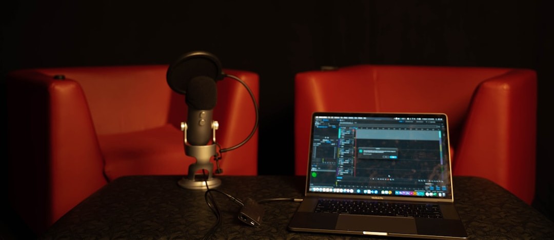 Podcast studio setup with microphone and chairs